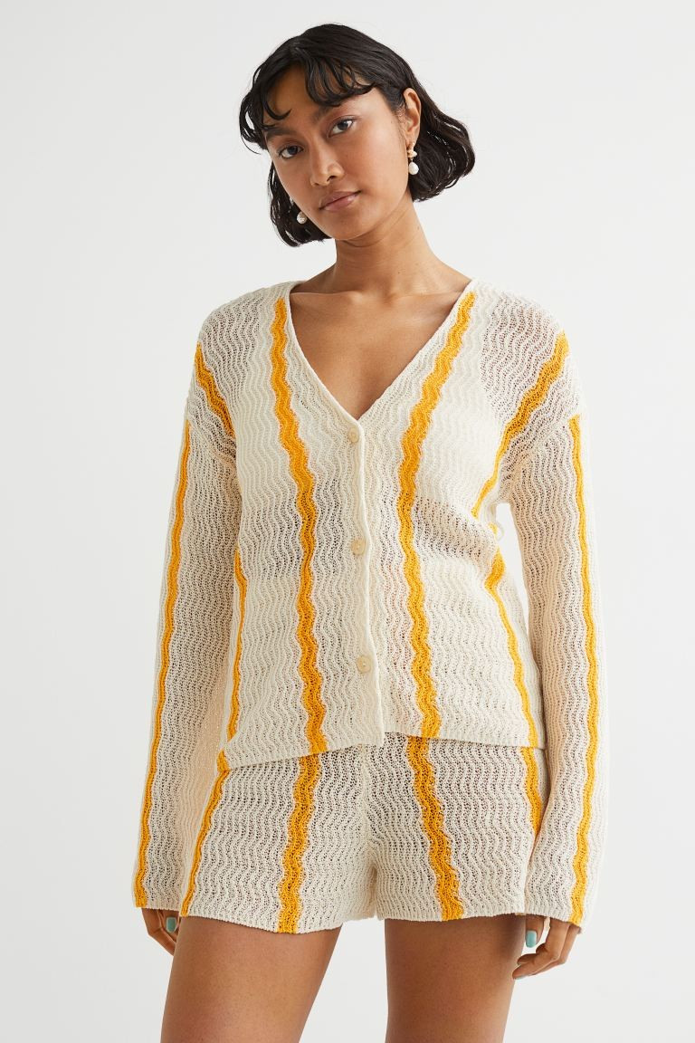 Cardigan in soft, textured-knit cotton with a crocheted look. V-neck, buttons down the front, dro... | H&M (UK, MY, IN, SG, PH, TW, HK)