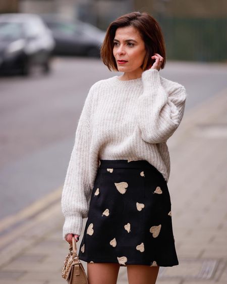 Beige Crop Knit Sweater Hearts Embroidered Wool-Blend Mini Bud Skirt Beige Knee-high boots Transitional Outfit Simple Casual Look Comfy Outfit

#LTKeurope #LTKstyletip #LTKSeasonal