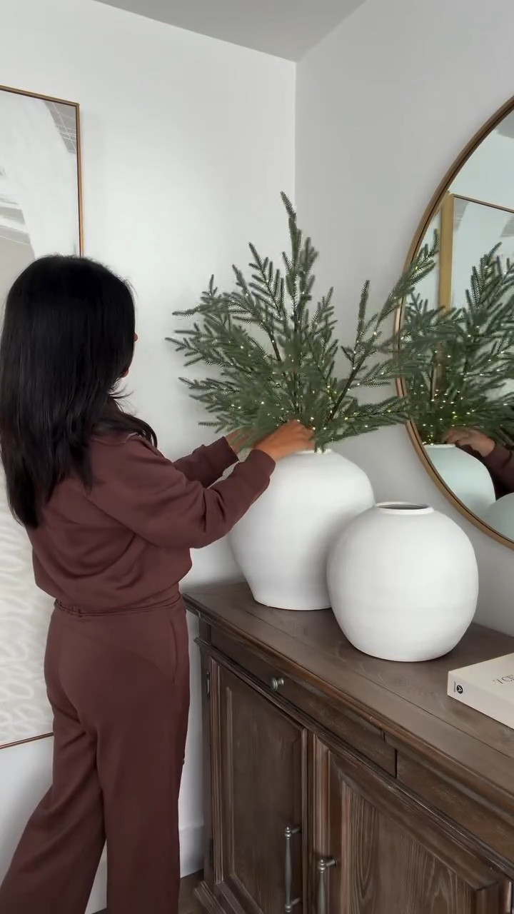 Holiday magic, simplified ✨ These pre-lit pine stems add instant warmth and glow — beautiful styled in a vase, on your console, or as a centerpiece. A timeless holiday look you’ll love year after year 🌲💫

#LTKHoliday #LTKSeasonal #LTKHome