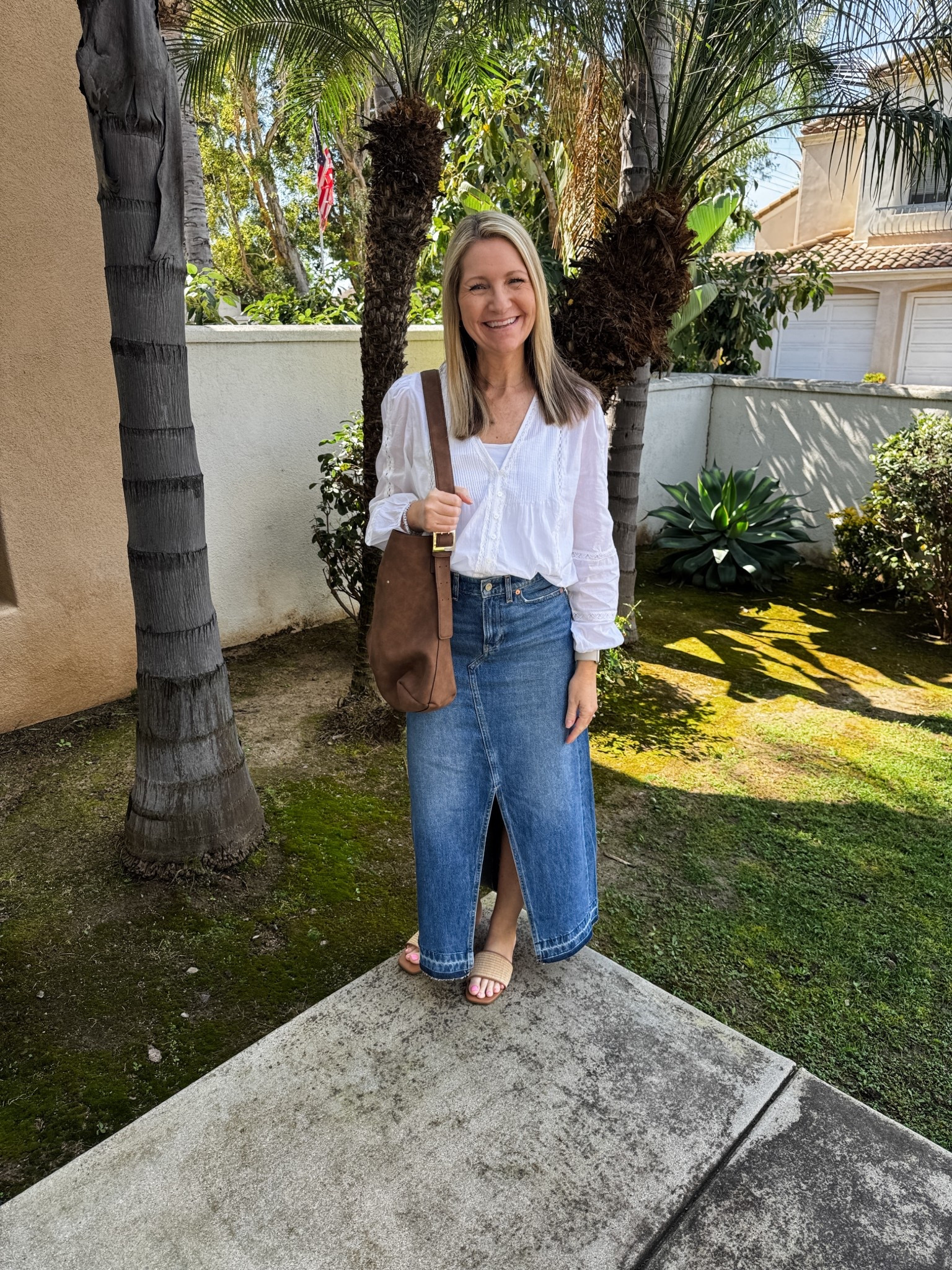 Nothing says Soring like a great lightweight white blouse. This lace trim v-neck style is Abercrombie and part of the LTK Sale. 

My denim skirt is Gap and comes in length options too. 

#LTKSpringSale #LTKootd #LTKSaleAlert