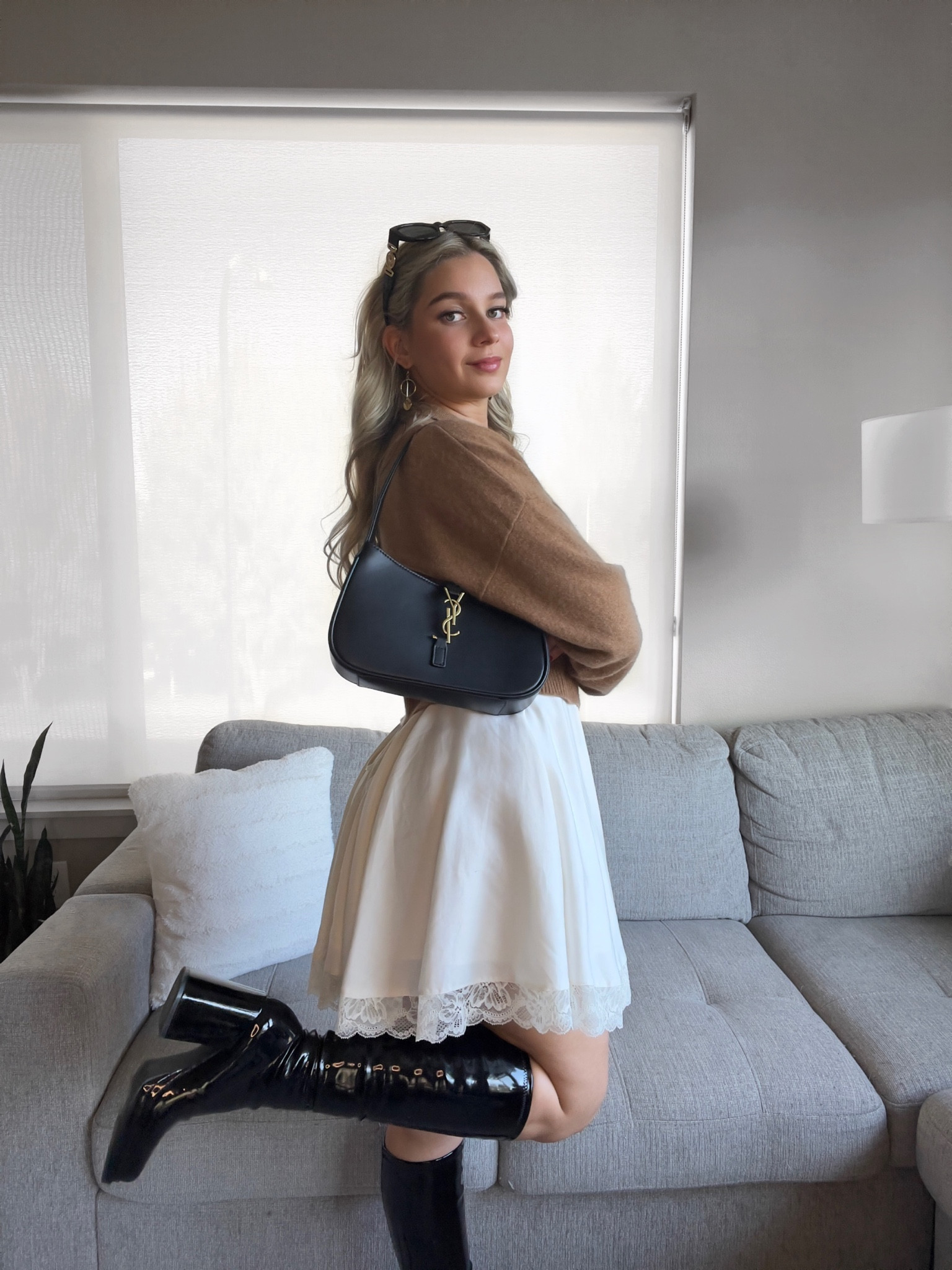 How to wear your summer dresses this season! 🍂 Add a warm tone cashmere sweater. There are no links for the one I am wearing. But your can find second hand with the name “reformation cashmere cropped polo sweater” The white dress is houseofcb and the black boots are Steve Madden object tall boot. 

#LTKHoliday #LTKstyletip #LTKSeasonal