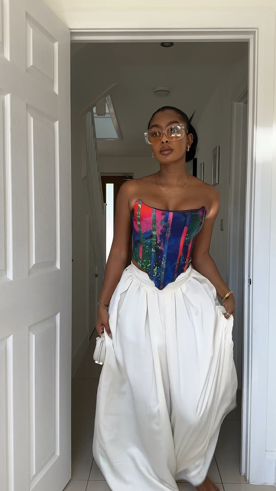 Flowy cream skirt with colourful corset 

#LTKstyletip #LTKuk #LTKtravel