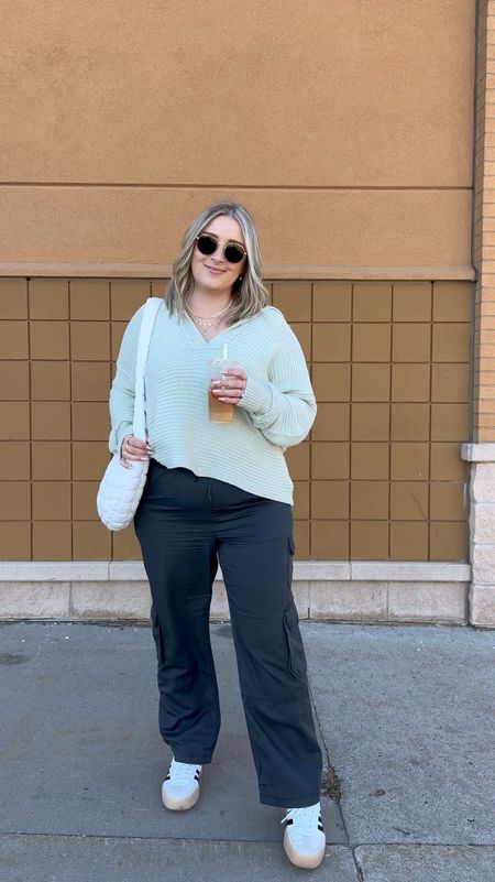 Casual midsize spring outfit - black cargo pants (L), free people sweater (M, also linked similar), quilted puffer bag, adidas sambas 



#LTKVideo #LTKmidsize #LTKSeasonal