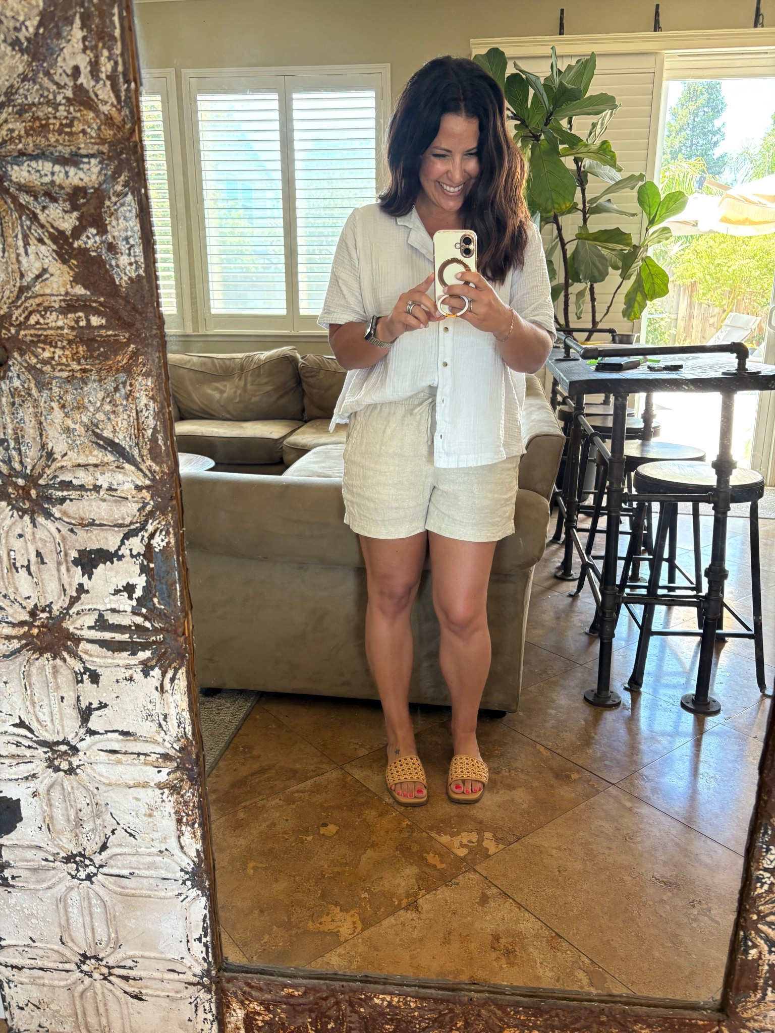 Summer vacation staples - linen shorts, a gauze shirt and elevated sandals. Easy and cool for a warm day. 

#LTKPetite #LTKTravel #LTKOver40