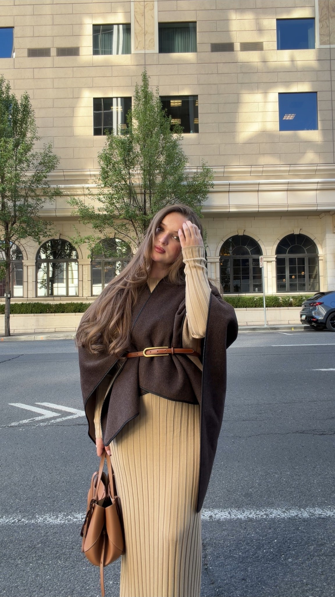 Cape thrift store 
Dress revolve 
Belt H&M 
Bag polene 