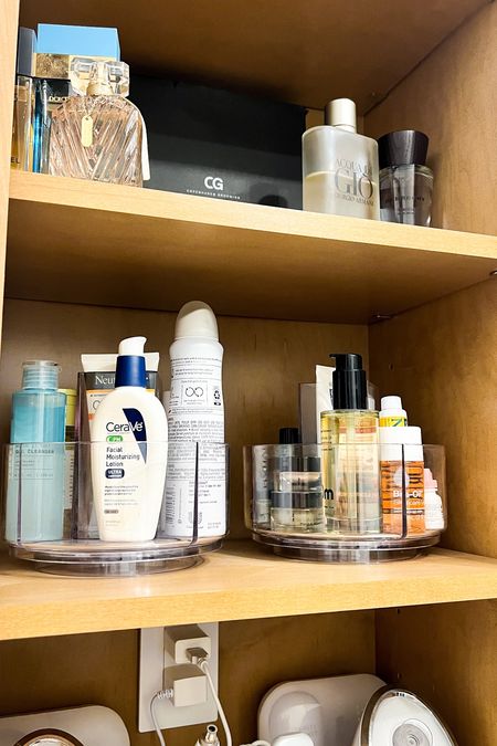 Clear acrylic turntables hold all of my skincare and getting ready products! I love simple organization bins for aesthetic bathroom storage.

#LTKunder50 #LTKbeauty #LTKhome