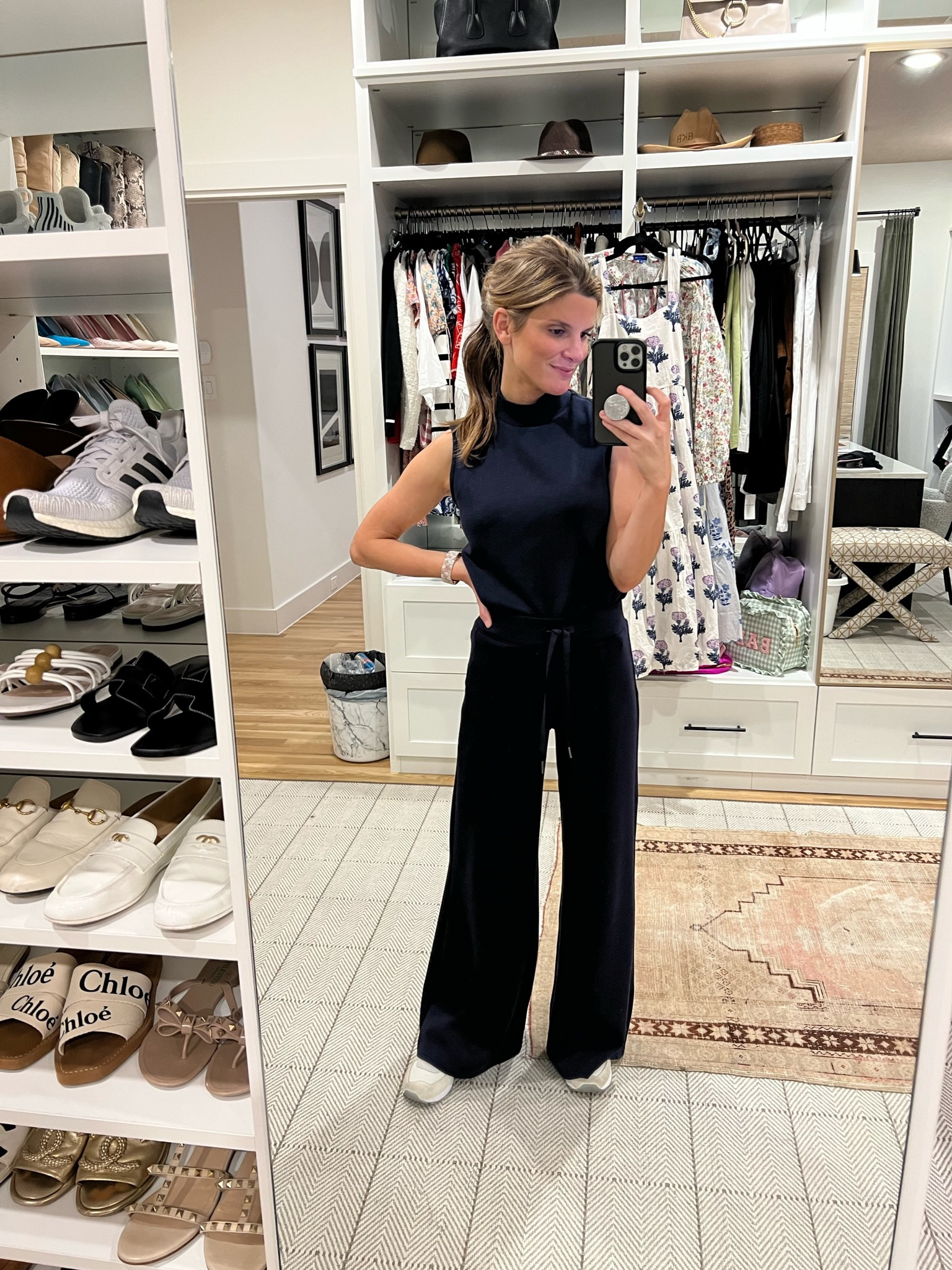 Spanx AirEssentials set. Wearing XS in both the pants and top. Would recommend getting petite in pants if you're under 5'4