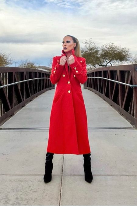 There is a really similar version of this long red double breasted gold button coat on sale but it’s selling out fast! Style it with black, blue, white or beige outfits for a true statement style.

#LTKsalealert #LTKSeasonal #LTKfindsunder100