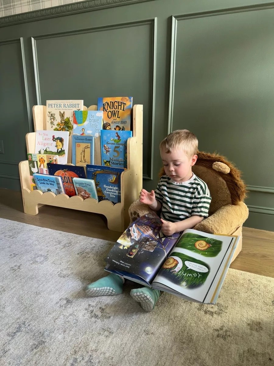 This scalloped bookshelf is honestly one of the best things we got for Matteo's room. It's so cute, and having his books right at his level means he's always reaching for them on his own!

nursery room finds, bedroom decor, storage tips, organization hacks, bookshelf, shelf styling, reading nook, bookworm, toddler room, montessori inspired, kids decor, amazon finds

#LTKKids #LTKHome