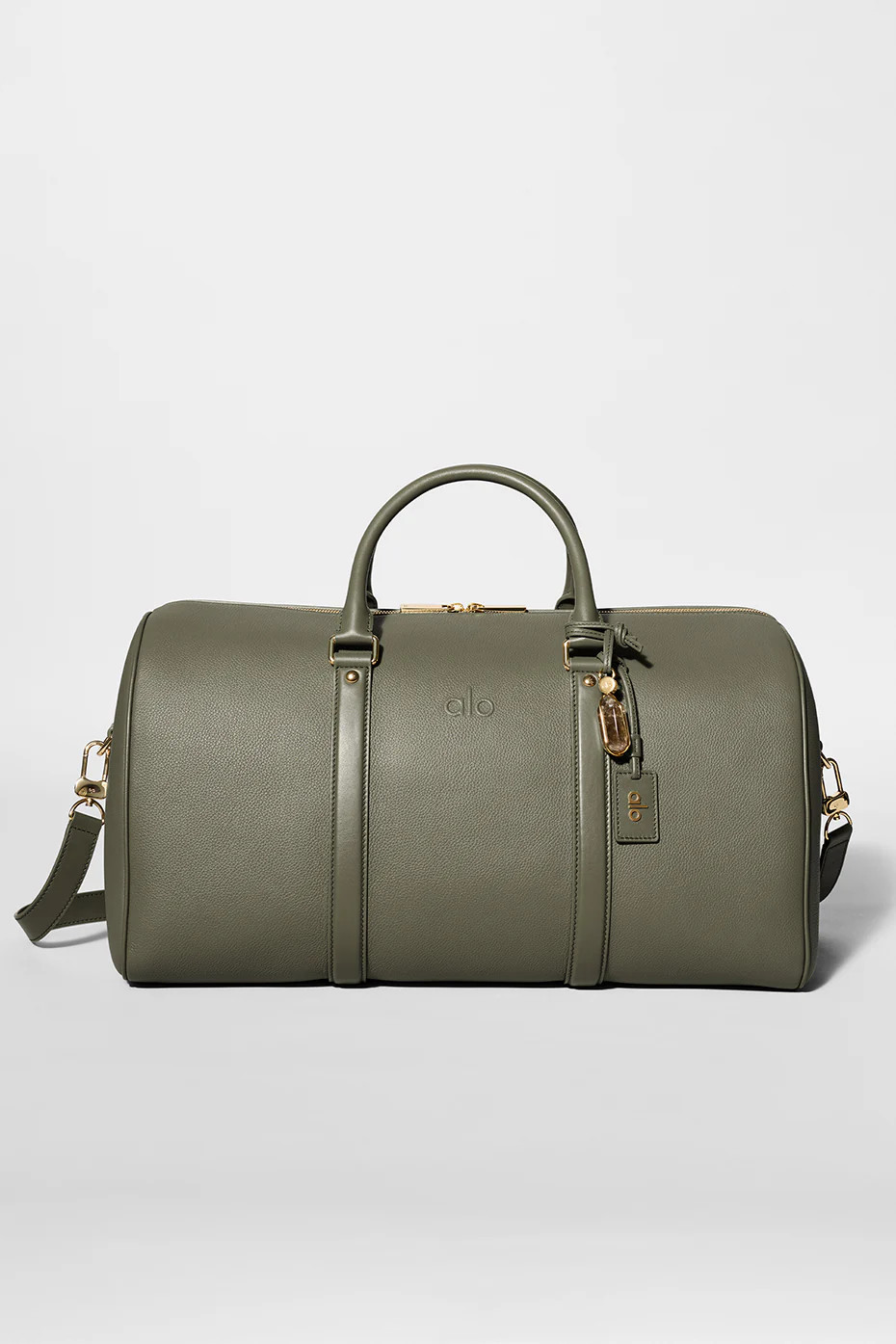 ALO Voyage Duffle Bag in Olive Tree Leather Green | Alo Yoga (US)