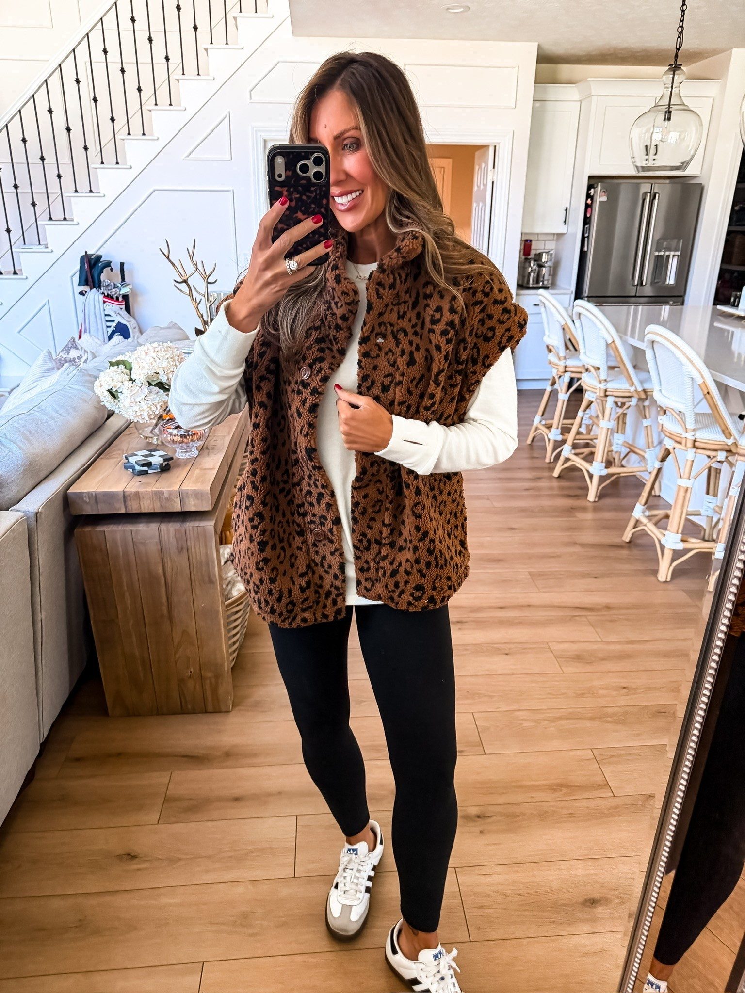 This leopard vest is such a fun fall layer and the easiest way to add a little personality to a simple outfit. I love it over a cream sweater with black leggings and sneakers for a cozy everyday look that still feels pulled together.

leopard vest, leopard print vest, fall layering, cozy fall outfit, leopard fall fashion, black leggings outfit, casual fall style, women over 40 fashion, fall outfit ideas, themominstyle