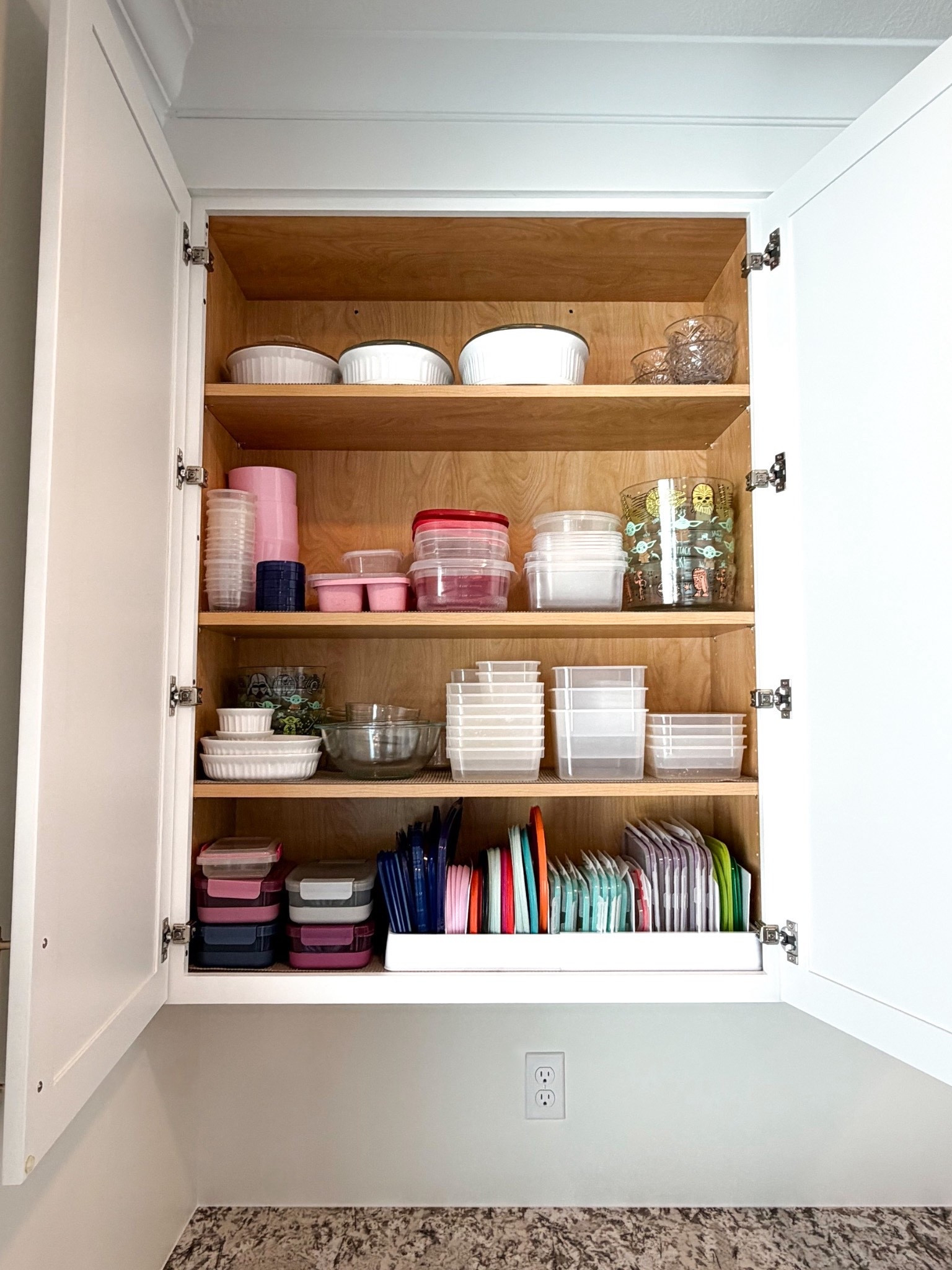 This lid organizer is EXACTLY what this cabinet needed. The lids were always falling out. Now I can neatly put them away and find them when needed.

#LTKHome