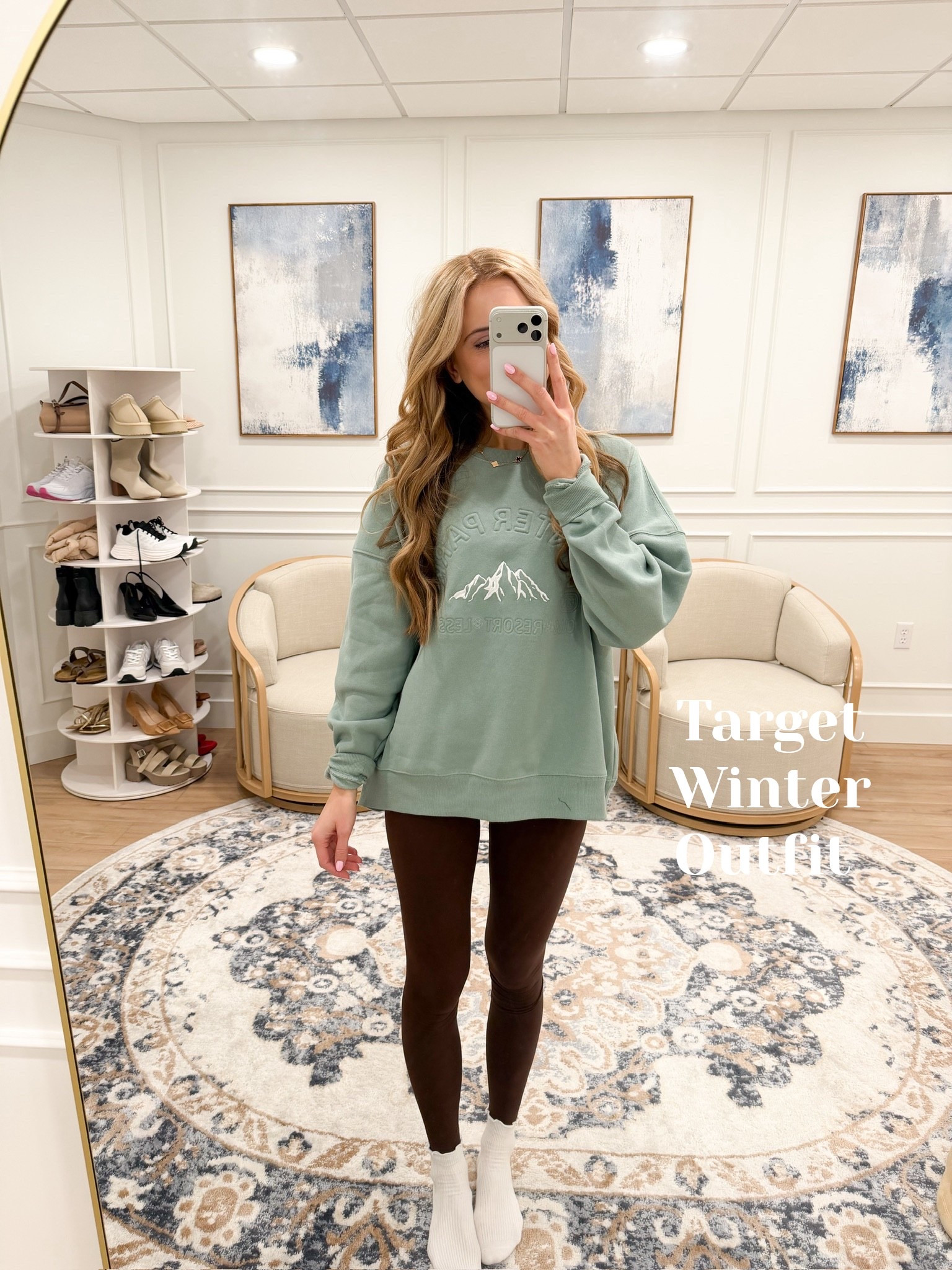 Target cozy finds! 🎯 Loving this oversized graphic sweatshirt for a comfy, laid-back winter vibe. The mint green pairs so well with chocolate brown leggings — perfect for lounging or running errands in style! Wearing size medium in the sweatshirt.

#LTKFindsUnder50 #LTKSeasonal #LTKActive