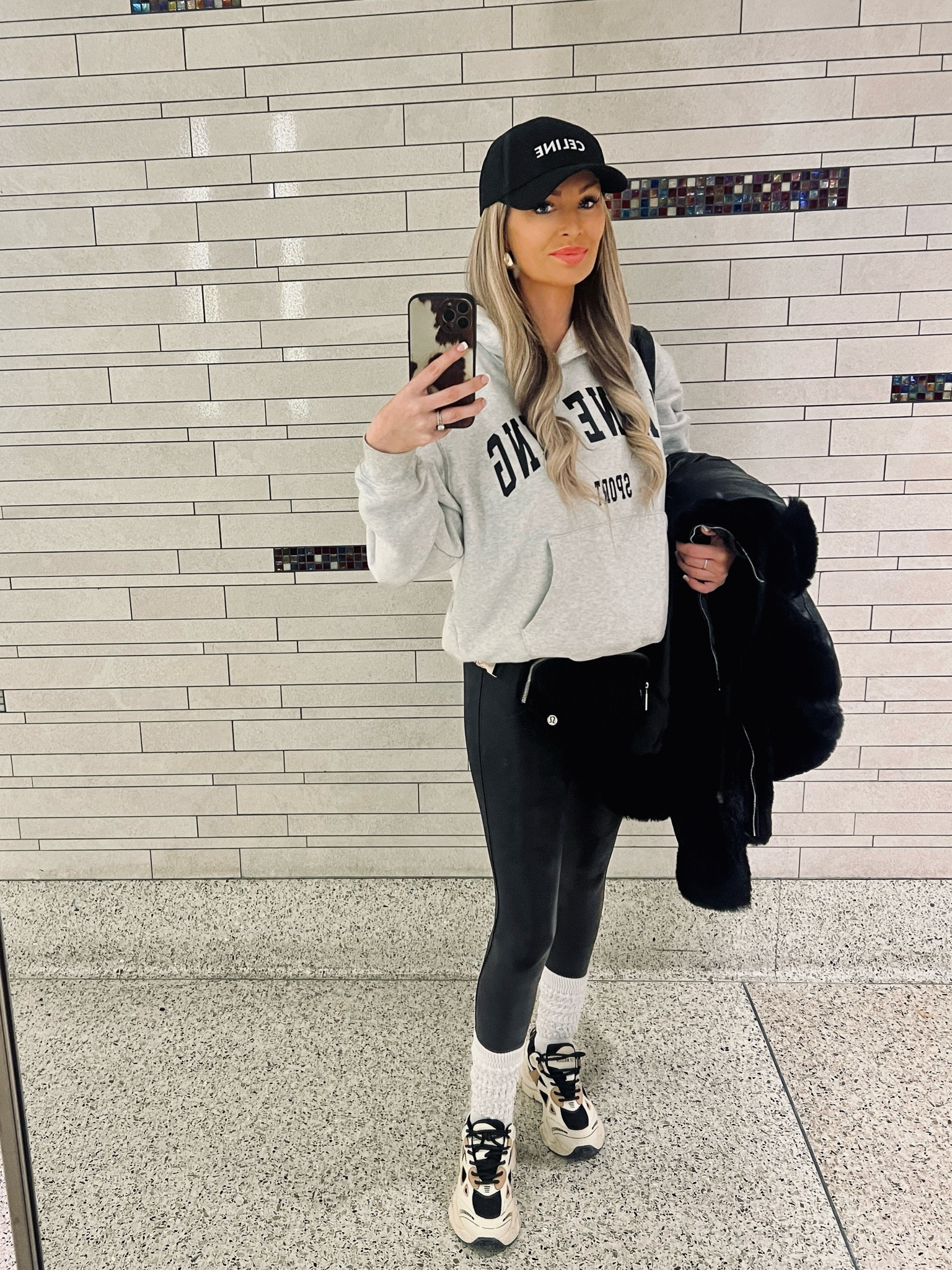 The most comfortable airport outfit! Easy access to phone, ID with the cross body belt bag and easy slip on and off chunky sneakers for security! These are my staple travel items #airportoutfit #styleguide #aninebing #celine #spanx #saleltk #scrunchsocks #trending 

#LTKstyletip #LTKfindsunder50 #LTKsalealert