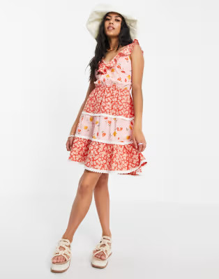 ASOS DESIGN textured tiered mini skater sundress with lace up back in mixed floral | ASOS (Global)