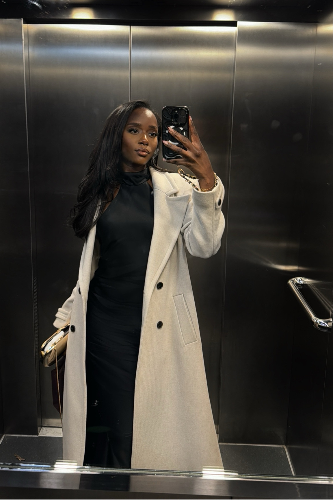 Dinner outfit, backless halter midi dress, wool coat, gold clutch 

#LTKstyletip #LTKSeasonal #LTKeurope