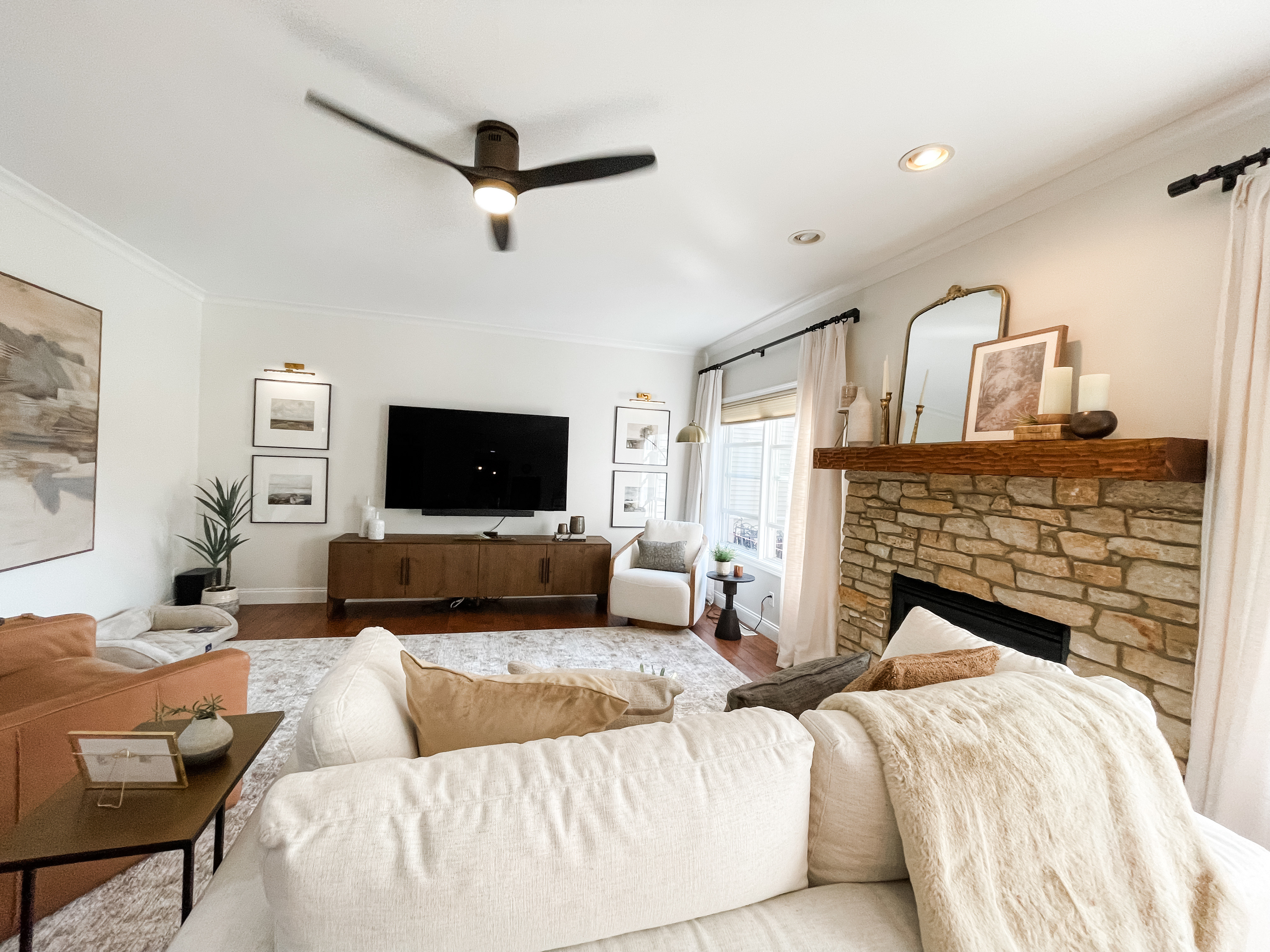 Neutral living room decor doesn't have to be boring. Layers of different depths of color and texture, lighting, and pieces that add visual interest throughout the space create a cohesive look still full of character.  

 #LTKSeasonal #LTKHome #LTKSaleAlert