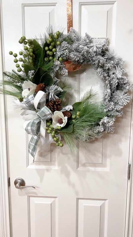 This 24” flocked wreath base is less than $13 and incredible quality - add your own decorations for a wreath just to your taste. I added a couple of picks and ribbon for a simple (but not boring!) winter wreath  

#LTKhome #LTKSeasonal #LTKCyberweek