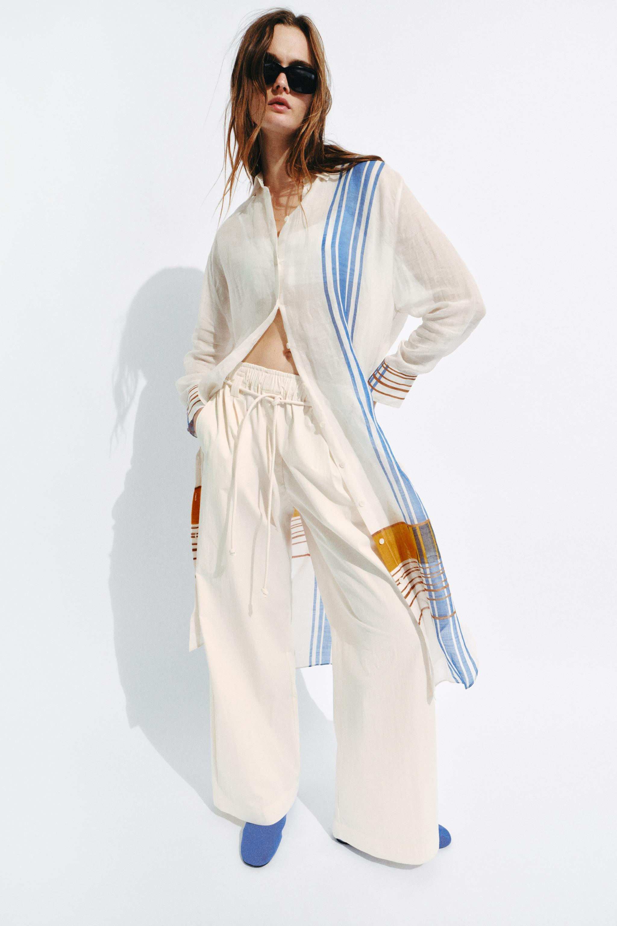 ZARA WOMAN COLLECTIONPants made of cotton blend yarn. Mid-rise and adjustable elastic waist with ... | Zara US