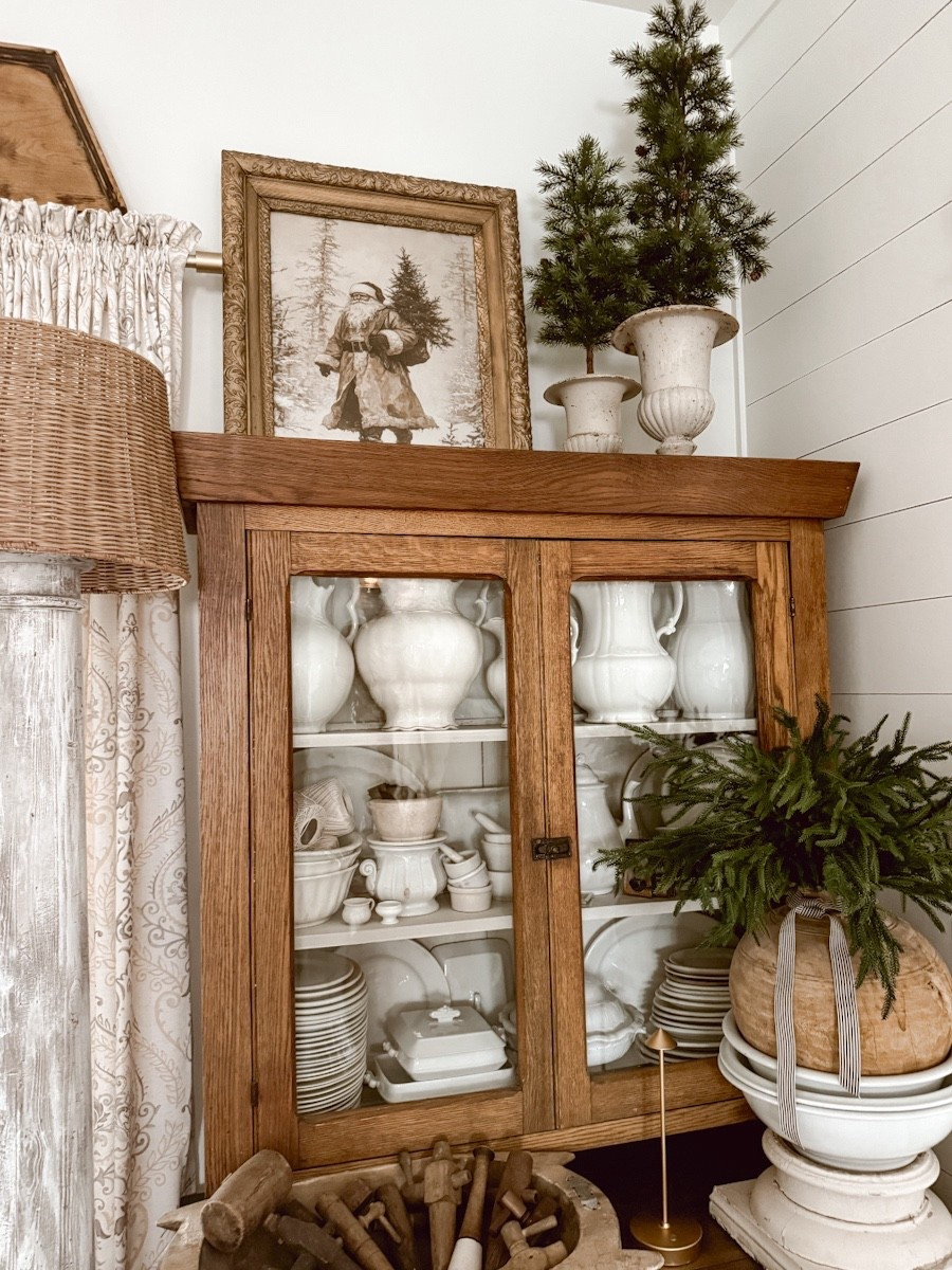 This is how I styled one of the shelves in the corner of my room. I added a Santa digital print and some holiday greens. 

#LTKHoliday #LTKHome #LTKSeasonal