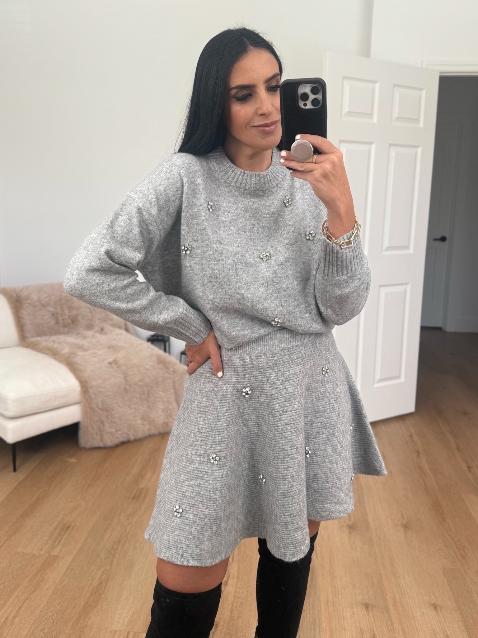 Free Assembly Women's Embellished Mock Neck Sweater with Long Sleeves wearing size small. Free Assembly Women's Embellished Mini Sweater Skirt wearing size small. 