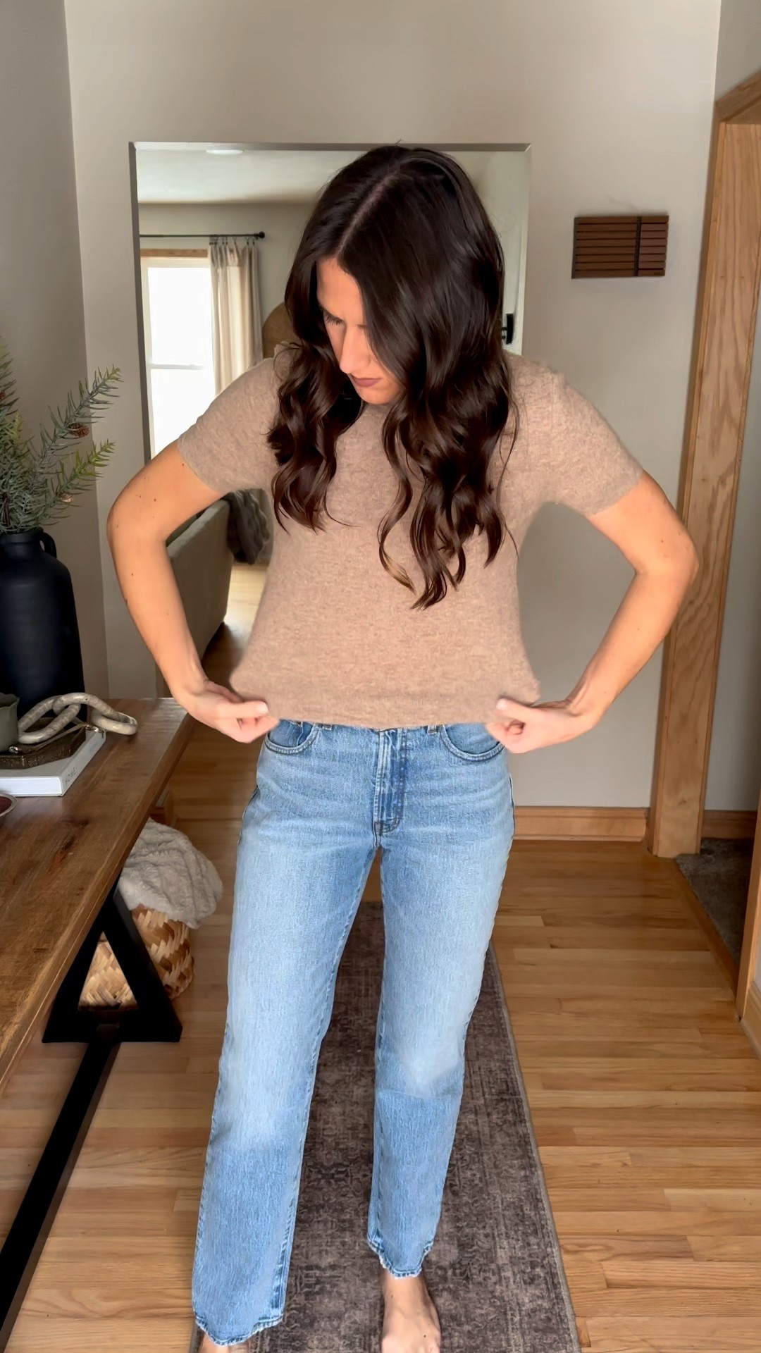 Classy but practical style 

Short sleeve sweater (size up, I’m in a medium) 
Jeans (size 26 regular) 
Blazer (medium) 