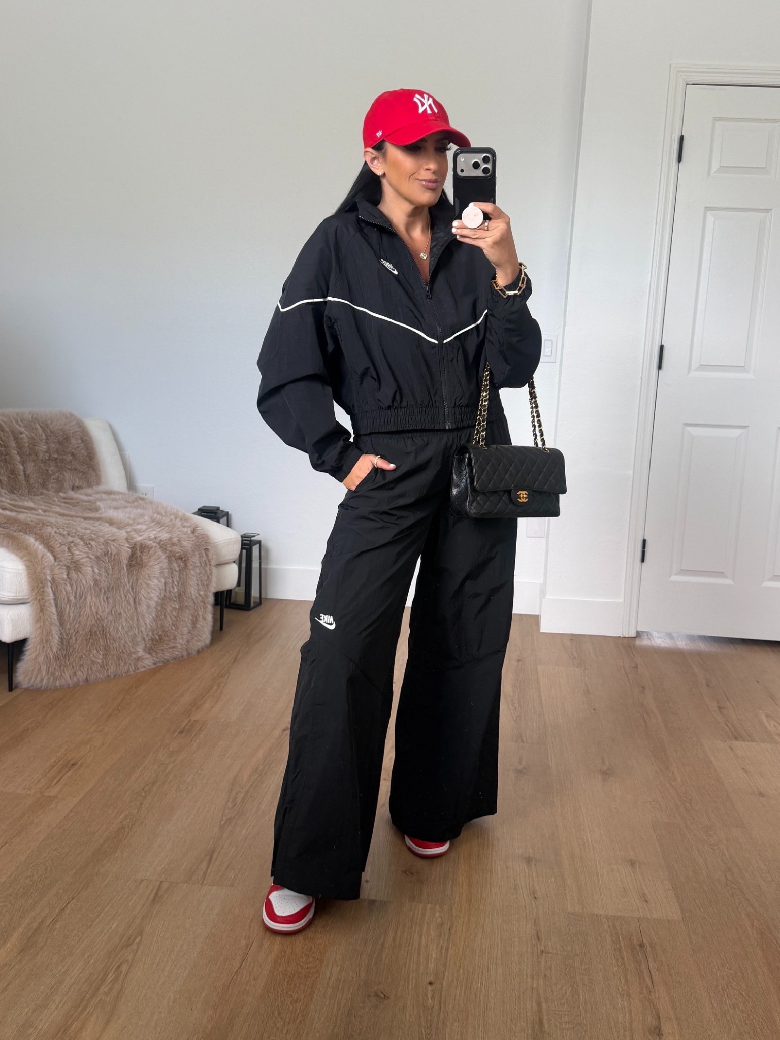 Nike Sportswear Windrunner Woven Jacket Speed wearing size medium. Sportswear Wide Leg Woven Pants wearing size small. 