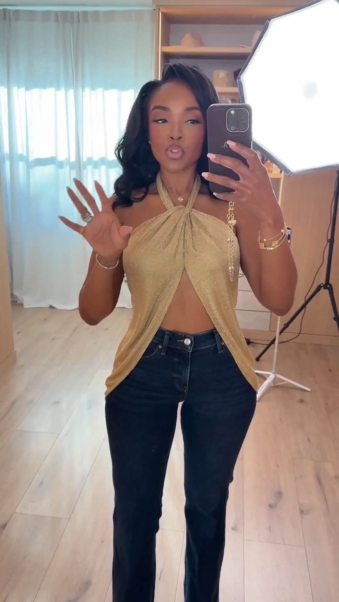 Scroll to shop this elevated outfit featuring a gold draped halter top styled with dark wash denim. Perfect for going out or casual date night✨

#LTKootd #LTKgrwm #LTKPetite