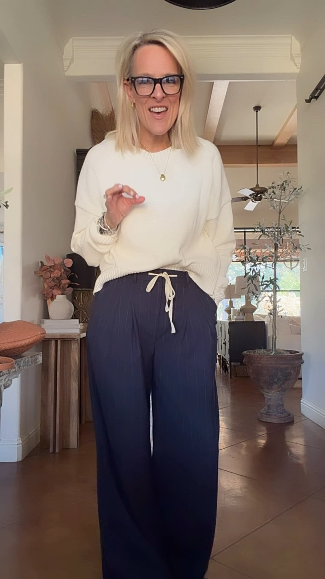 pinstripe (slight pinstripe) trousers are back in stock!! 
• sizing • size down one size in these. I’m in XS
An easy comfortable elevated look. And I love that I can wear my most comfortable sneakers with these. ￼

Quince sweater - true to size. 100% organic cotton! 

Great travel outfit 


#LTKOver40 #LTKdayinmylife #LTKTravel
