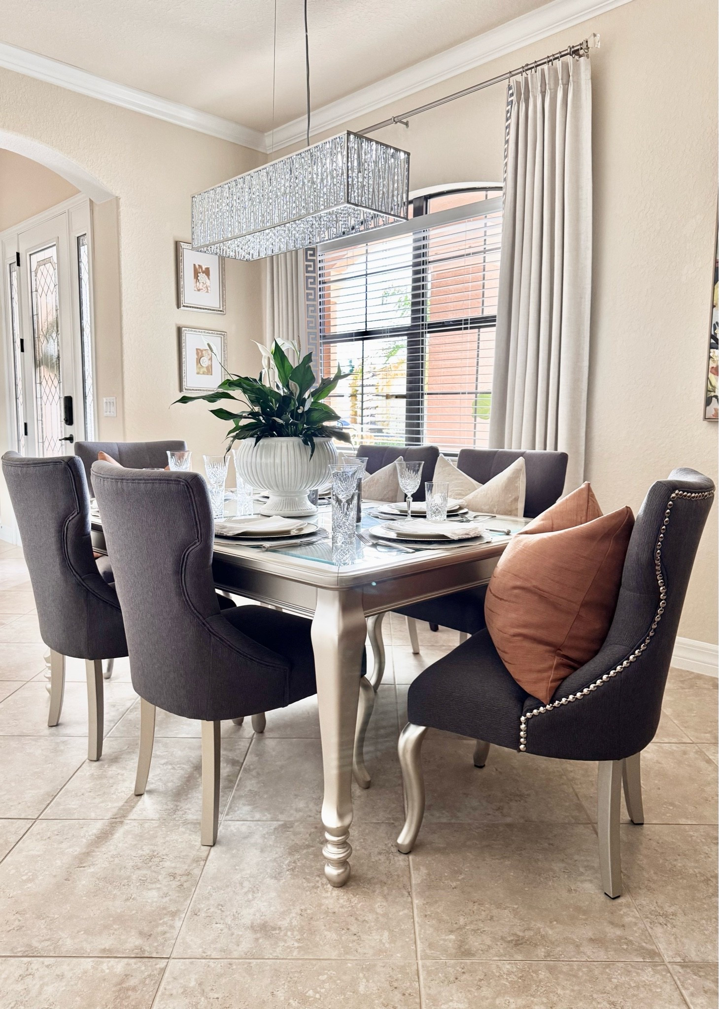🍽️I love setting the table in our formal dining room, layering delicate placemats, simple charger plates, white dinner plates, and nicely folded, white cloth napkins! 

A comfortable dining space invites guests to linger, connect, and relax long after the meal is finished!🩶🤎🩵

Summer Hosting & Entertaining | Tabletop | Tablescape | Placemats | Charger Plates | Dinner Plates | Crystal Drinkware | White Napkins | Throw Pillow Covers & Inserts | Drapes | Transitional Dining Room

#LTKHome #LTKSeasonal #LTKdayinmylife