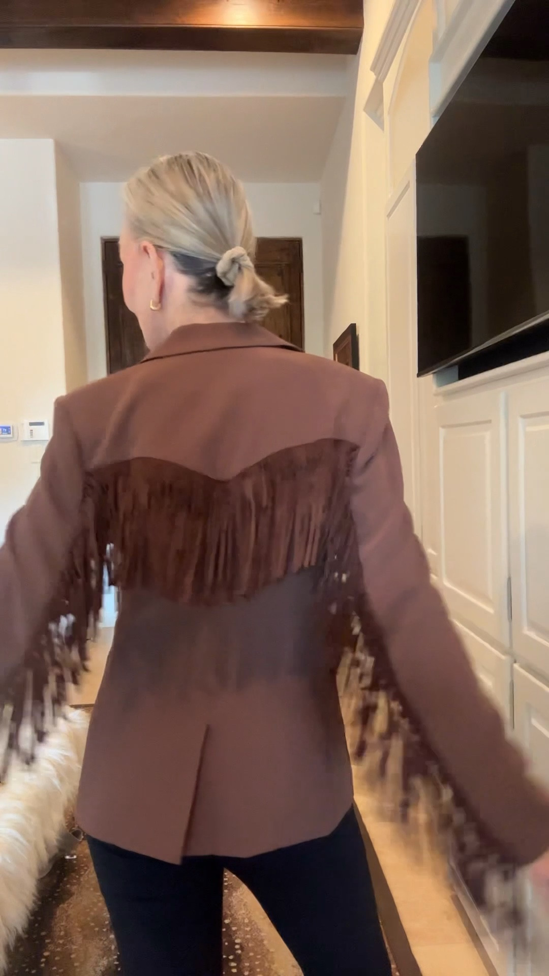 Suede fringe Cheyenne Blazer

Walk on the wild side with the Suede Fringe Cheyenne Blazer. This piece showcases exquisite fringe detailing on both the back and chest, creating a striking focal point that elevates its classic blazer shape. Made in a rich brown, it is perfect for autumn, blending texture and timeless style for a bold seasonal look

#LTKSeasonal #LTKStyleTip #LTKOver40