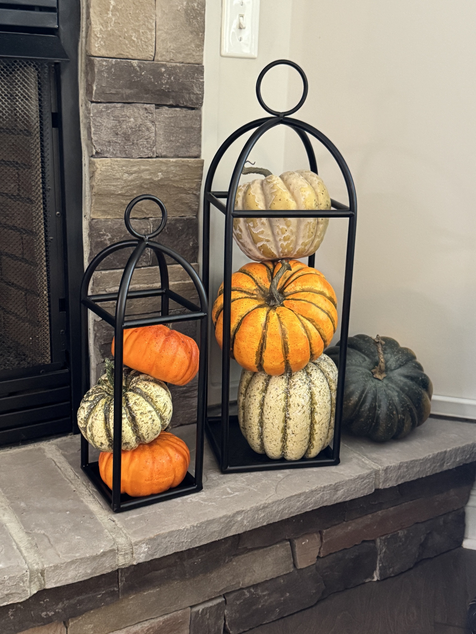 Fall decor on the fireplace hearth

#LTKHome #LTKStyleTip #LTKSeasonal