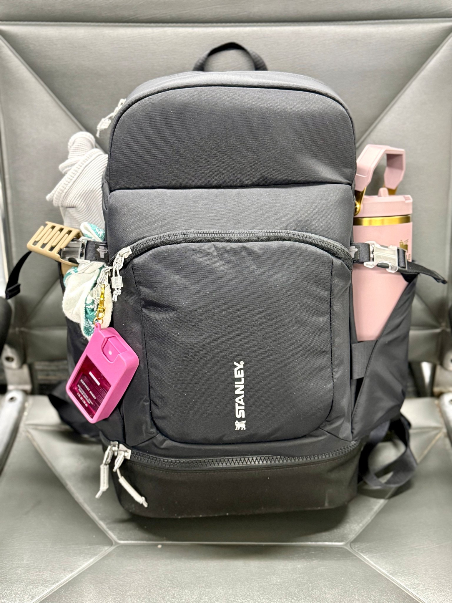 NEW RELEASE and I’m actually so excited about this one 🙌🏼

I decided to test it out as my new travel bag and it’s SO good. It’s a little bigger than my usual carry-on backpack, but not bulky at all. Fits my Quencher AND my Vitalize shaker (love that built-in securing belt), plus my MacBook Pro with room to spare.

The pockets?? 10/10.
Top pocket is super easy to grab your essentials.
Front zip for keys/wallet/phone.
The bottom compartment is my favorite — perfect for shoes, or post-workout clothes (but for this trip I put a change of clothes for me and the kids in there.)

Padded straps are comfortable, has the side clip, sturdy top handle, and it slides right under the seat in front of you on the plane ✈️

Three color options so far and you truly can’t go wrong with black. I have a feeling this one will sell out quickly.

#stanley1913partner @stanley_brand #ad

#LTKActive #LTKfitnessgoals #LTKTravel
