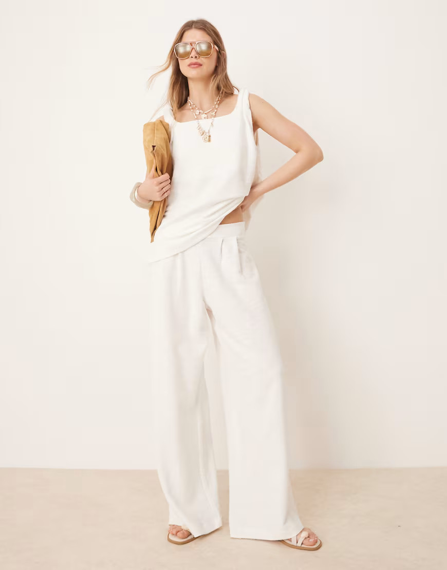 ASOS DESIGN pleat front wide leg pants in white boucle jersey | ASOS (Global)