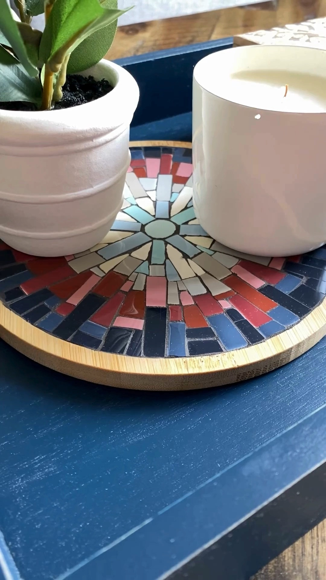 A handmade mosaic can do more than protect a tabletop...it can become part of the story of a room.

For this tablescape, I layered a few simple décor pieces around one of my handmade mosaic trivets to create a cozy focal point in front of a sunlit window. Sometimes it's the smallest handmade details that make a space feel more personal and inviting.

Shop the look and items I used below.

For mosaic tips, tutorials, inspiration, and so much more please visit my YouTube channel: YouTube.com/julieweilbacher, and follow @julieweilbacher on Instagram.

#homedecor #tablescape #coffeetabledecor #homestyling #trivet #handmadehome

#LTKHome