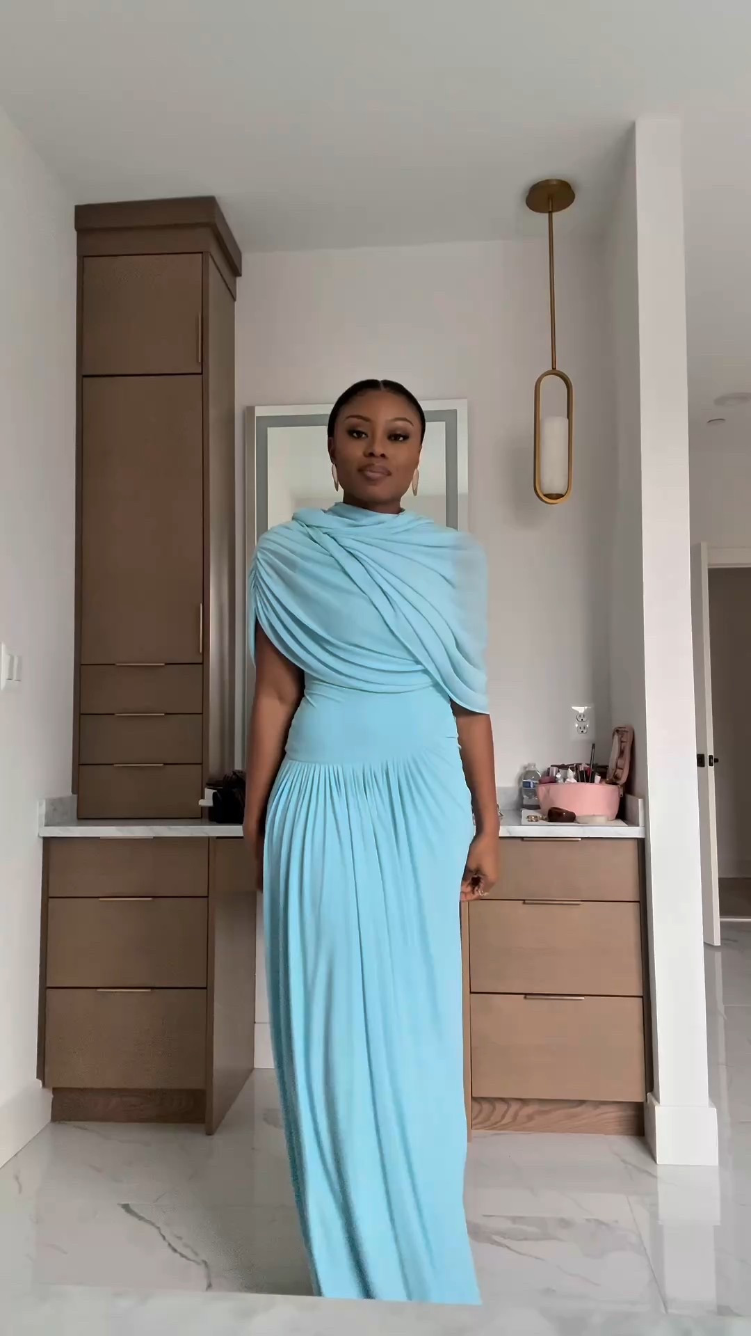 What to Wear: Winter wedding guest or for your next holiday party

Draped blue gown 

#LTKHoliday #LTKWedding #LTKOver40