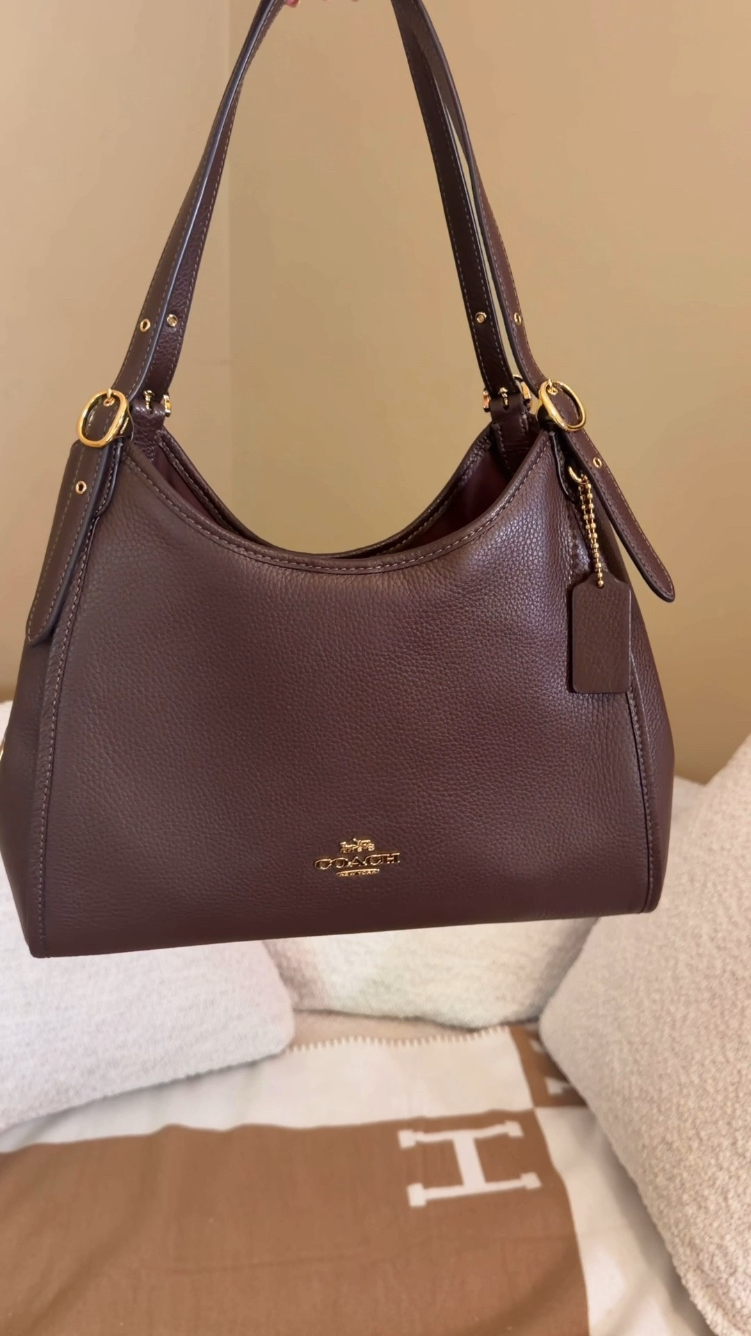 I have been thinking about this maple Coach Outlet Erin since I saw her in store and regretted to getting her 😍 fortunately she’s back it stock 🍂 Comment SHOP & I’ll dm you the link 🤎

This is the perfect everyday fall bag, not too big not too small and I love how long the shoulder straps are. It feels really comfortable and has plenty of room for everything you need ♥️ the suede Erin is also back in stock and I linked it 👜