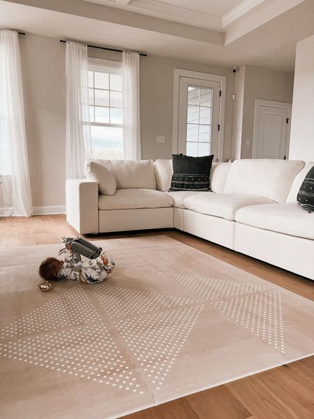 When your living room « rug » is a beautiful play mat 🤍

#toddlekind play mats on sale now for Mother’s Day with code: tkmamas20
.
#baby #babyplayroom #playmat #livingroom #livingroomrug #rug #fakerug #whitecurtains #curtainrods #whitecouch 

#LTKGiftGuide #LTKhome #LTKSeasonal