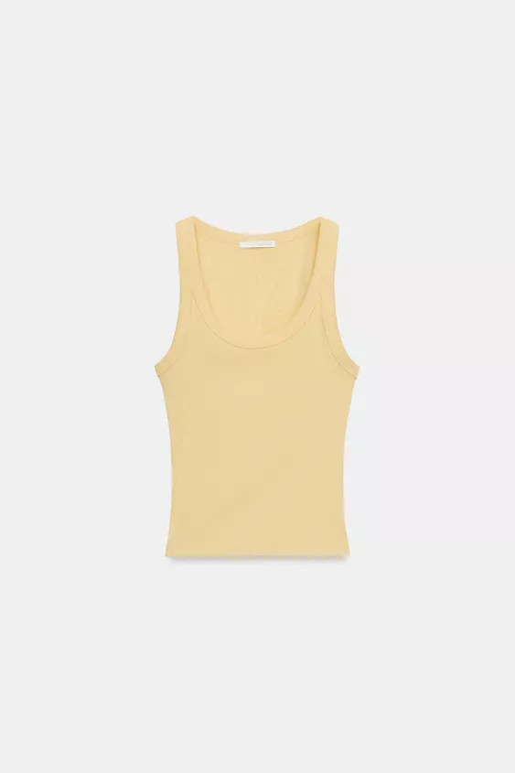 Top made of a cotton blend yarn. Featuring a round neckline, sleeveless design and straight hem. | Zara UK