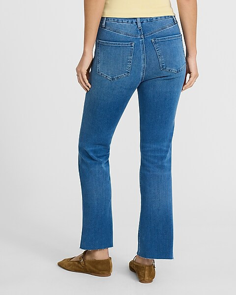 High Waisted Medium Wash Raw Hem Flexx Cropped Flare Jeans | Express