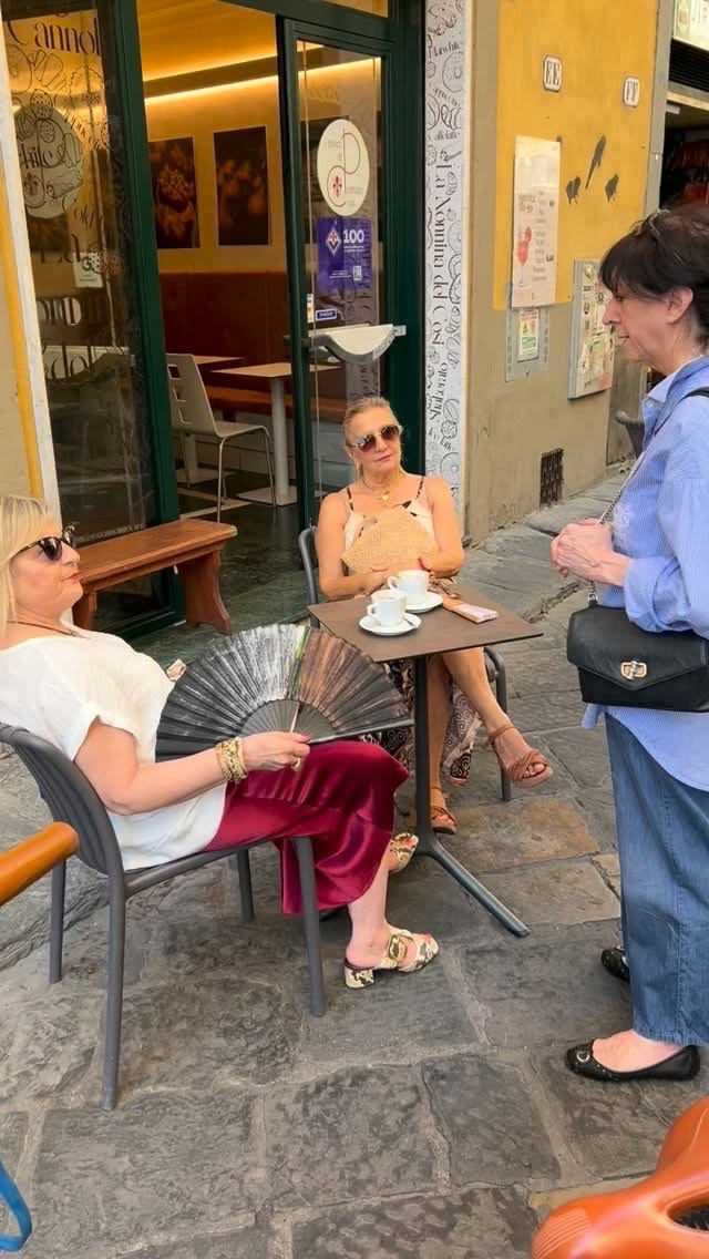 The chicest way to stay cool in Italy. No one works a fan like an Italian woman.