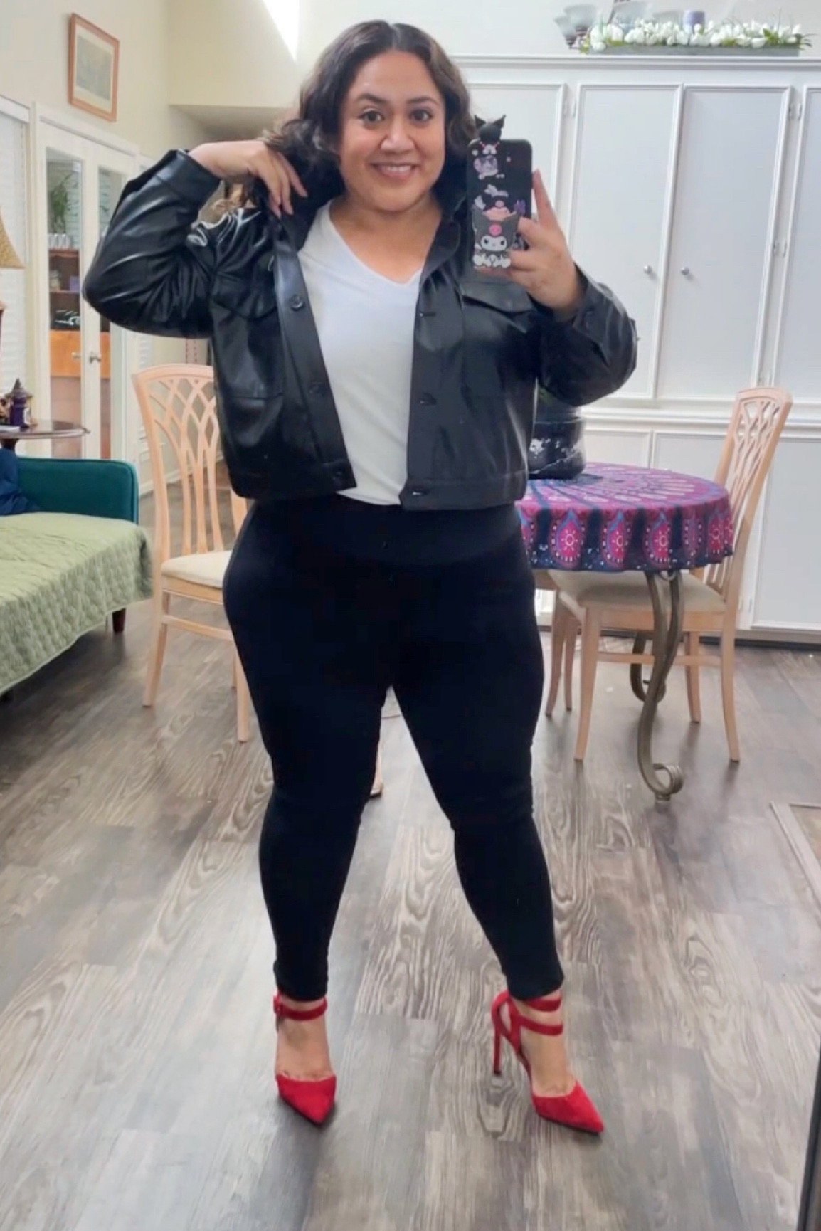 Fall outfit 
Vegan cropped shirt 
White tee 
Black thick wasted leggings
Pop of color with red close toe pumps

#LTKworkwear #LTKstyletip #LTKover40