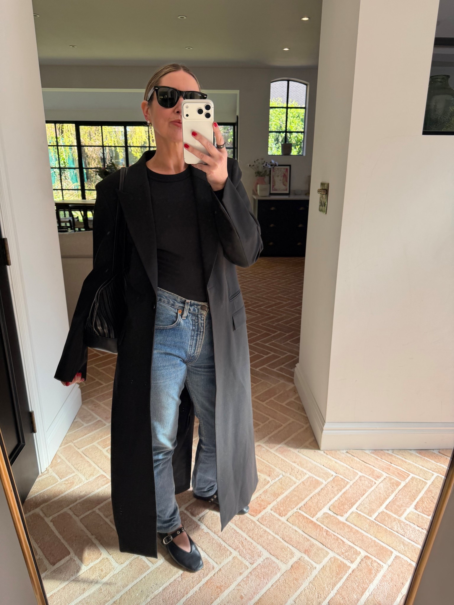 My go-to uniform - vintage Levi’s, black bodysuit, long coat + ballet pumps 

#LTKjeans #LTKspring #LTKuk