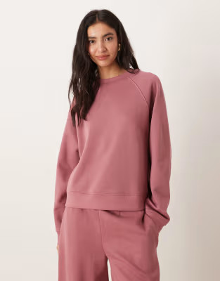 ASOS DESIGN oversized brushback sweatshirt with raglan detailing in rose pink | ASOS | ASOS (Global)