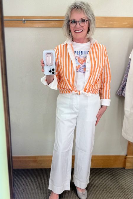 This cantalope and white boyfriend striped shirt from Talbots has wide white cuffs, a white placket down the front and just exudes happy vibes. It’s a crisp poplin and in a longer length, so you can tie it at the waist or wear it over slim pants. I paired it with this Aperitif tee, which has a playful summer feeling that just makes me want to go on vacation and the  New England Chinos that come in 5 colors and misses, petite, petite plus and plus sizes.

#fashion #fashionover50 #fashionover60 #talbots #talbotsfashion #talbotsspringsale #springfashion @#springoutfit #graphictee #chinos

#LTKsalealert #LTKstyletip #LTKSeasonal