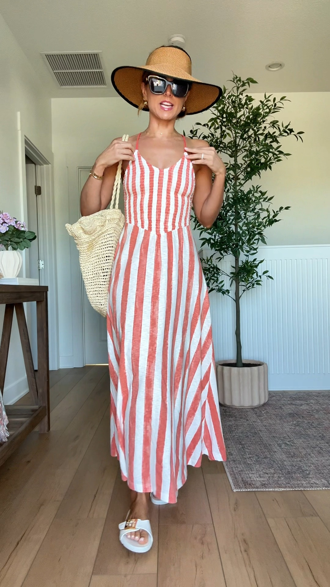 My beach outfit of the day! XXS in striped maxi dress! Beach day. Resort outfit. Resort wear. Vacation outfit. Vacation dress. Tory Burch buckle jelly sandals. Eric Javits packable UPF 50+ hat. Target straw bag. Gucci sunglasses. 


#LTKTravel #LTKSwim #LTKootd