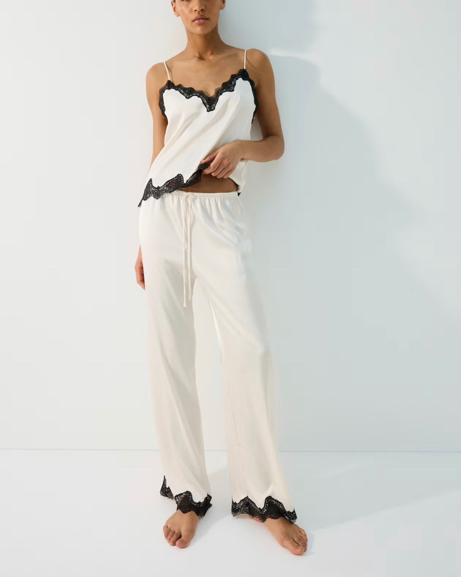 White satin pajama set with black lace trim - also in a nightgown version!

#LTKSeasonal