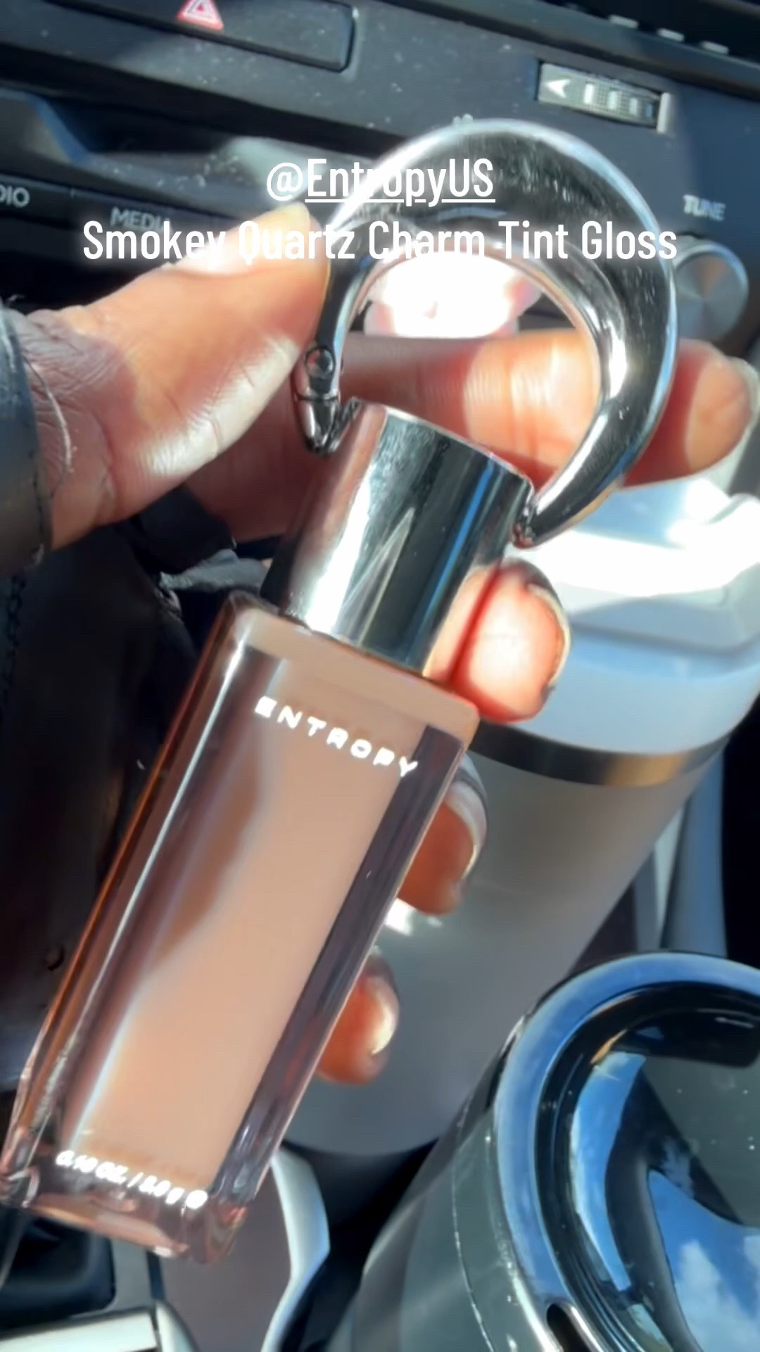 POV: you finally found the perfect brown-girl-friendly nude 🤎✨ The Entropy Charm Tint Gloss in Smoky Quartz has been in constant rotation because the formula is SO milky, smooth, and flattering. It gives that effortless glossy nude lip without washing you out, and the shine is just perfection. And can we talk about the packaging? The luxe bag charm detail makes it feel like an accessory and a lip gloss all in one. I’m obsessed 😍👜✨

#BrownGirlBeauty #LipGlossAddict #NudeLipCombo #BeautyMustHaves