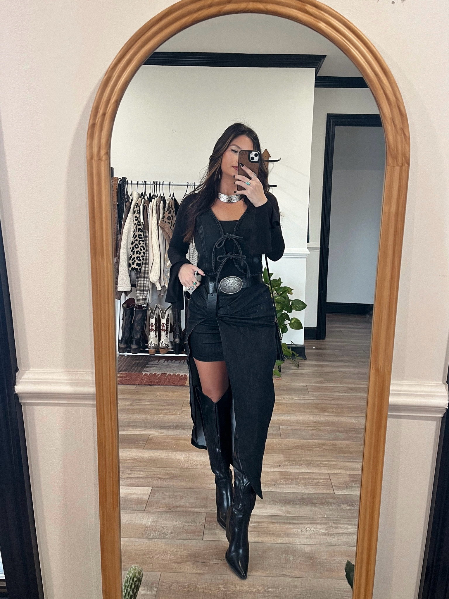 All black edgy western outfit! Bell sleeve top paired with stretchy midi skirt and tall black boots! Code LORI to save on both top & skirt. Cuff necklace was a thrift find but linking similar 

#LTKStyleTip #LTKShoeCrush #LTKSeasonal