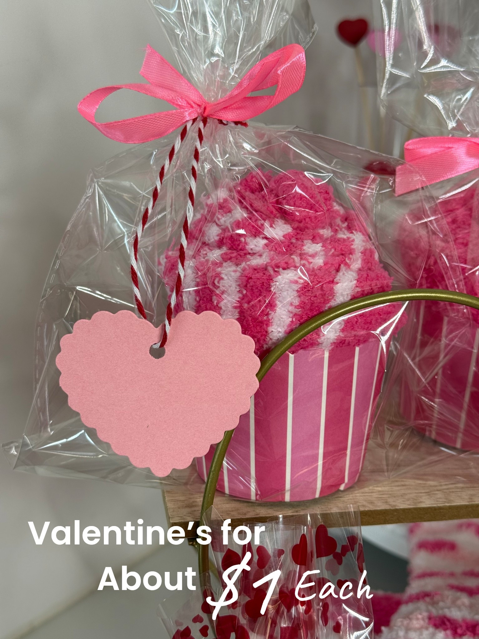 The cutest Valentines for only a little over $1 each!! This kit comes with 60 of everything you see. 60 pairs of cozy, fuzzy, Valentines socks in different patterns, 60 cupcake wrappers also in a variety of patterns, 60 cellophane bags, 60 paper tag hearts, the red and white rope, and a spool of pink ribbon. They are absolutely adorable in person. Perfect for class valentines, teacher gifts, coworker gifts, fundraisers, etc  #valentinesdaygiftguide #valentinesdaysocks 

#LTKKids #LTKValentine #LTKSeasonal
